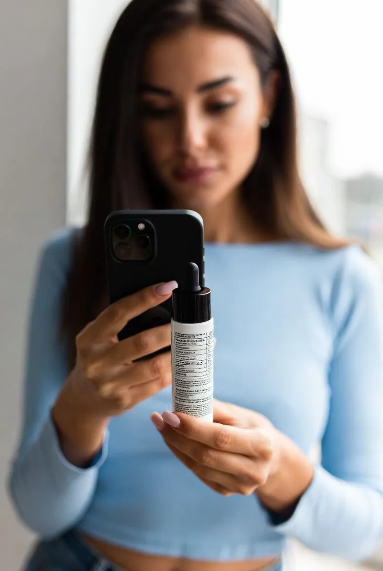 Woman using the PregSafe app